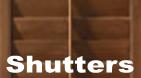 Shutters available in natural wood and faux wood.